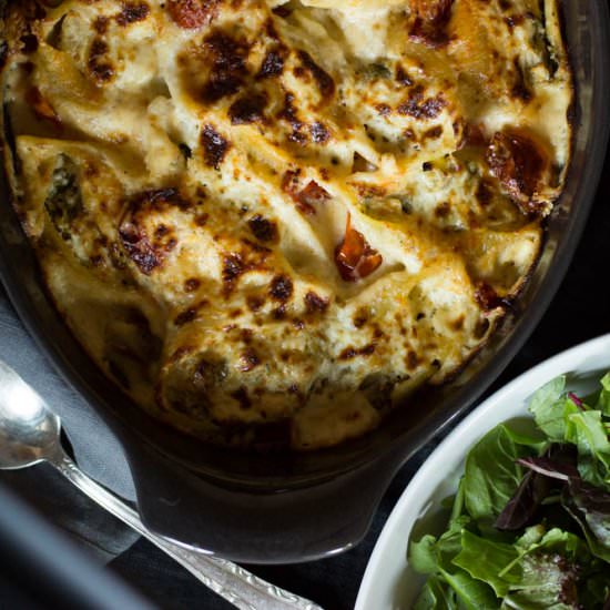 big shells with artichokes arugula