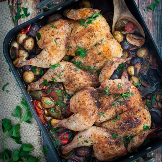 Butterflied roast chicken on veg