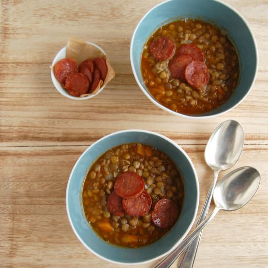 Lentil soup with spicy salami