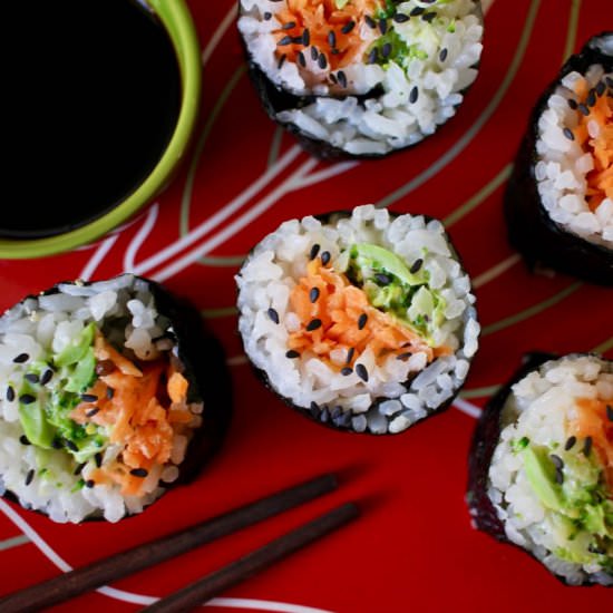 Sushi with pickled carrot + greens