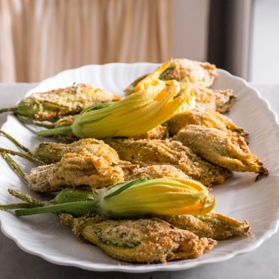Baked stuffed zucchini blossoms