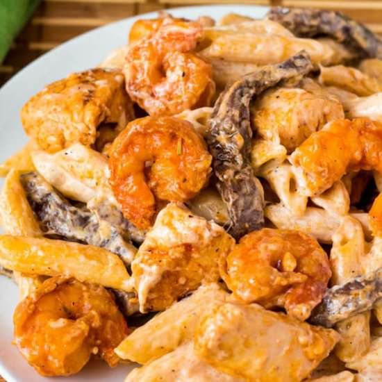 Shrimp Chicken and Steak Alfredo