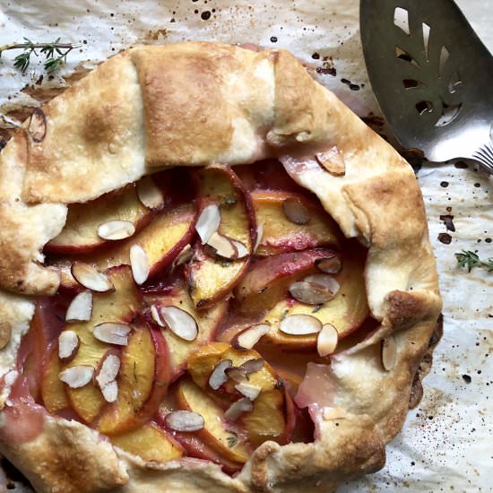 rustic thyme-infused peach tart