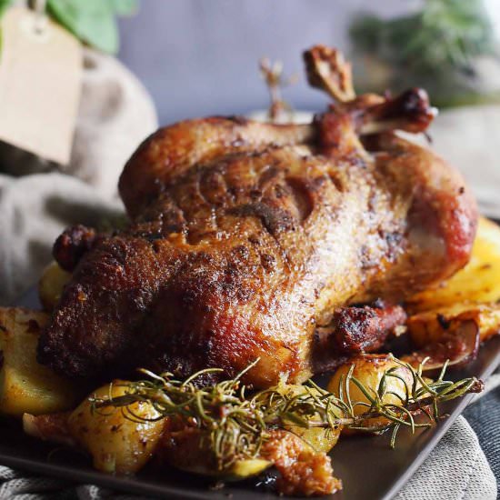 Roasted duck with potatoes and figs
