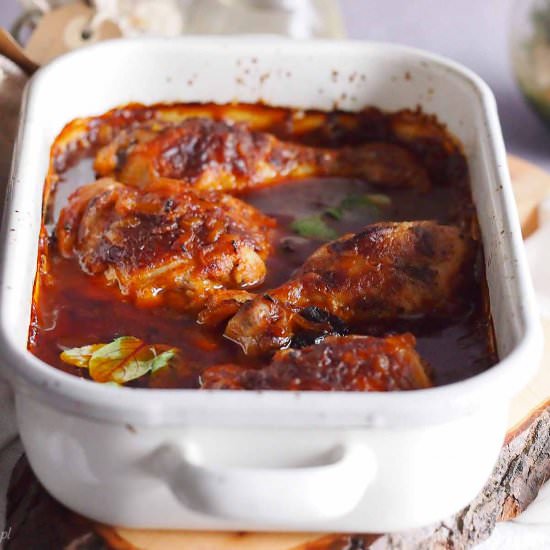 Chicken legs baked with plum sauce