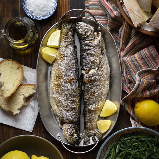 Broiled trout with dandelion greens