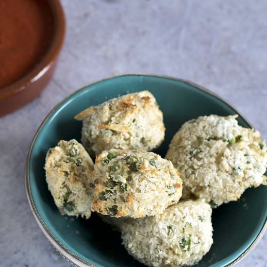 Baked arancini with tomato sauce
