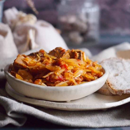 Meaty cabbage stew with mushrooms