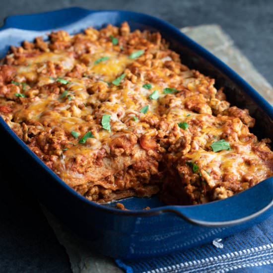Layered chicken enchilada casserole