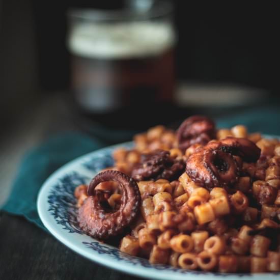 Octopus with pasta in tomato sauce