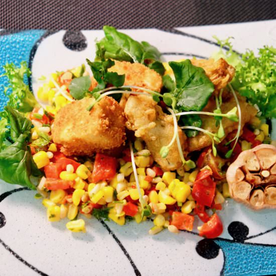 Crumbed silken tofu on corn salsa