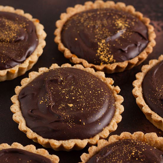 Chocolate and salted caramel tarts