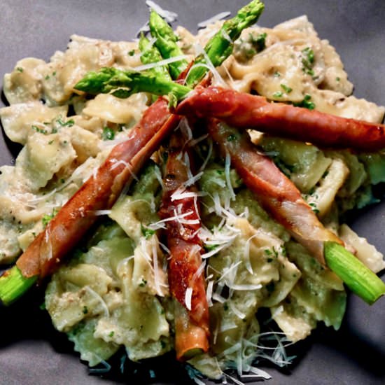 Speck wrapped asparagus on pasta