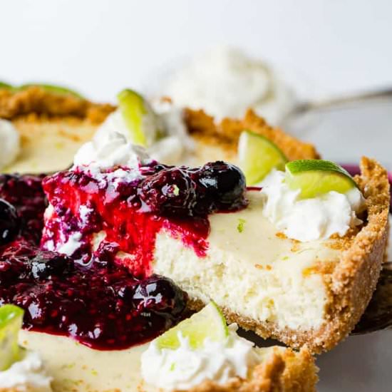 LIME CHEESECAKE WITH BERRY SAUCE