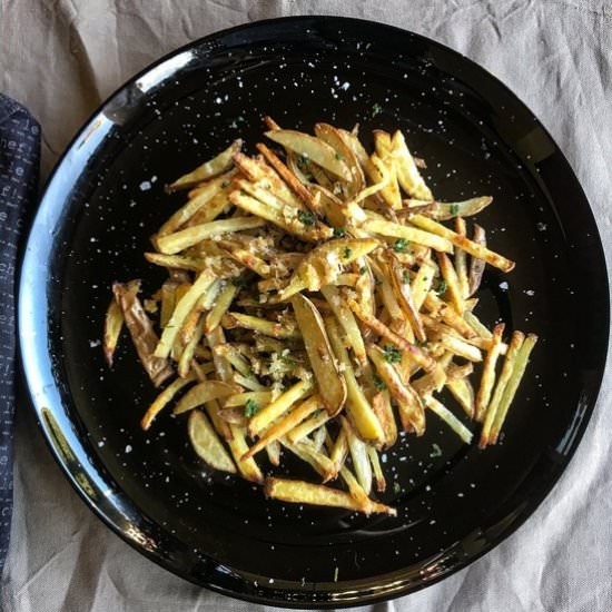 Oven fried garlic potatoes