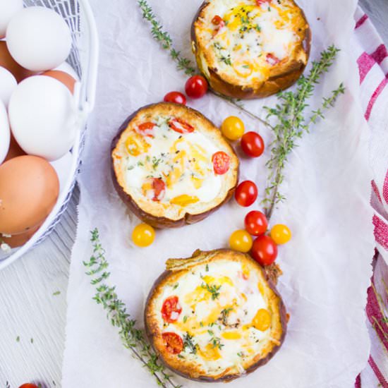 Baked Eggs in Bread Bowls