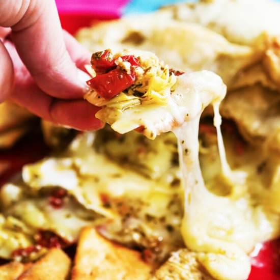 Pesto Baked Brie w/ Artichokes