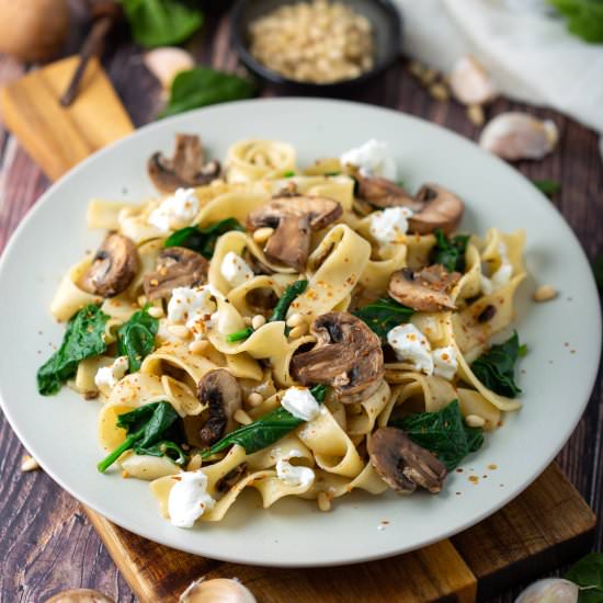 Wide pasta with mushrooms