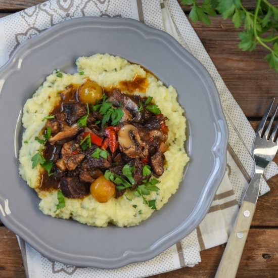 Beef stew with mushrooms and puree