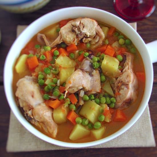 Stewed rabbit potatoes peas carrots