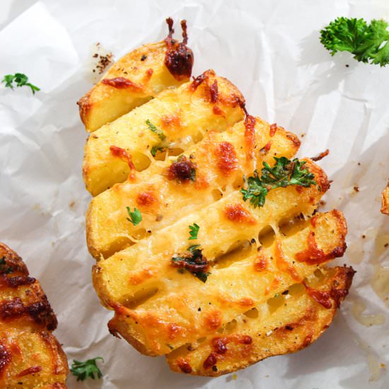 Cheesy Scored Baked Potatoes