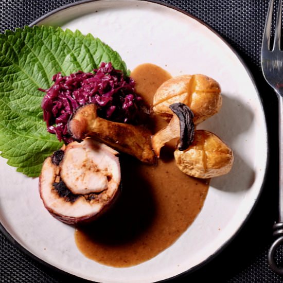 Trio of garlic wrapped in chicken