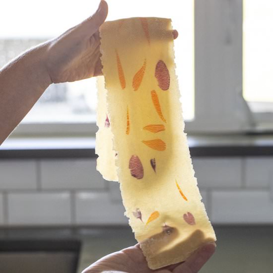 Laminated pasta with edible flowers
