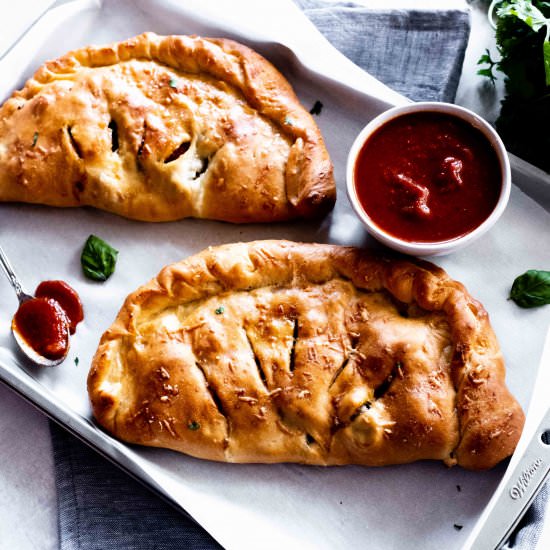pepperoni and mushroom calzones