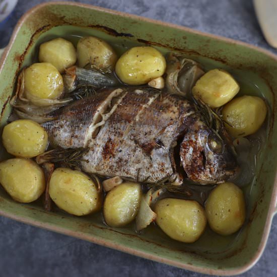 Baked sea bream with potatoes