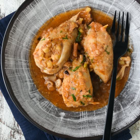 Squid stuffed with apple