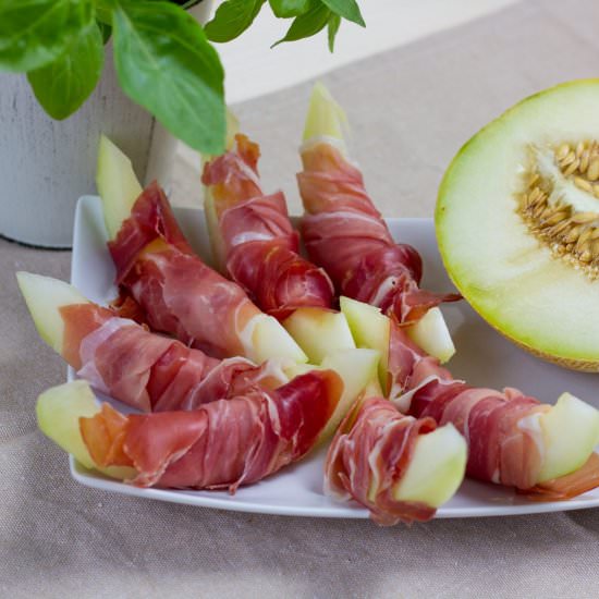 Melon wrapped in Parma ham