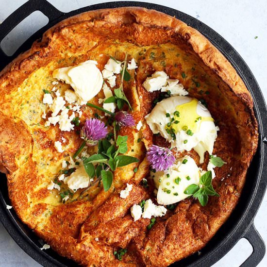Dutch baby with cheese and herbs