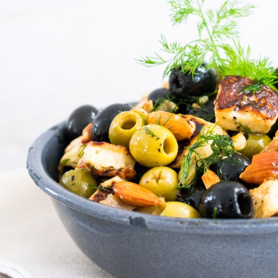 Marinated cheese and almond olives