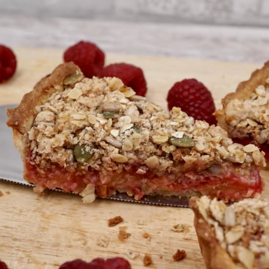 Plum and raspberry crumble tart