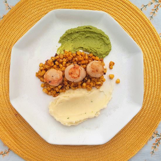 Scallops over corn with pea puree