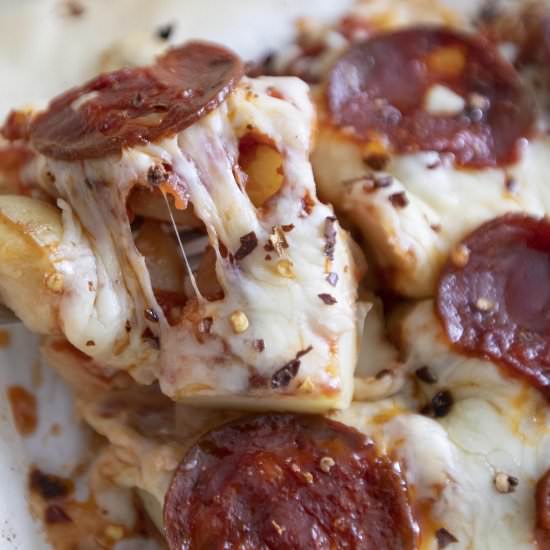 Smashed potato pizza with pepperoni