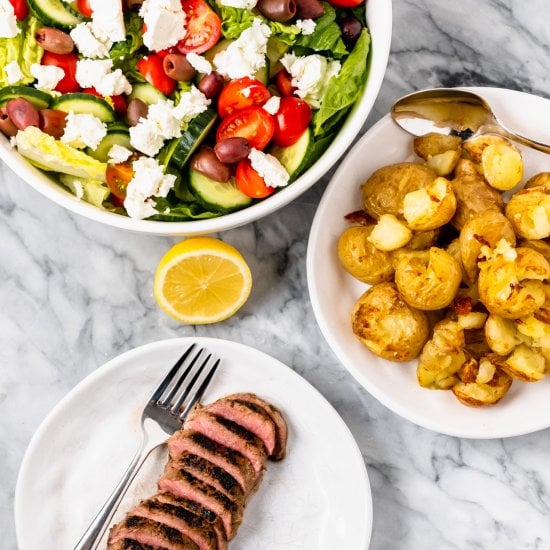 Lamb with Crispy Potatoes and Greek Salad
