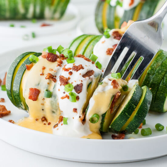 Cheesy Loaded Hasselback Zucchini